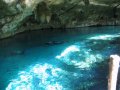 snorkel-dosojos-7 Unos buzos emergen por una de las salidas del cenote