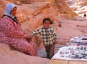 Bedouins sell necklaces, pieces of coloured rocks, etc