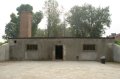 auschwitz-07 Reconstruccin del edificio que albergaba los hornos crematorios y una cmara de gas, en el Campo de Concentracin de Auschwitz