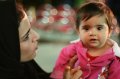 img_1464 Una mujer insta a su hija a posar para la cmara, en las inmediaciones de la Tumba de Hafez, en Shiraz