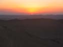 La luz del atardecer, da un bonito colorido al desierto que rodea Palmira